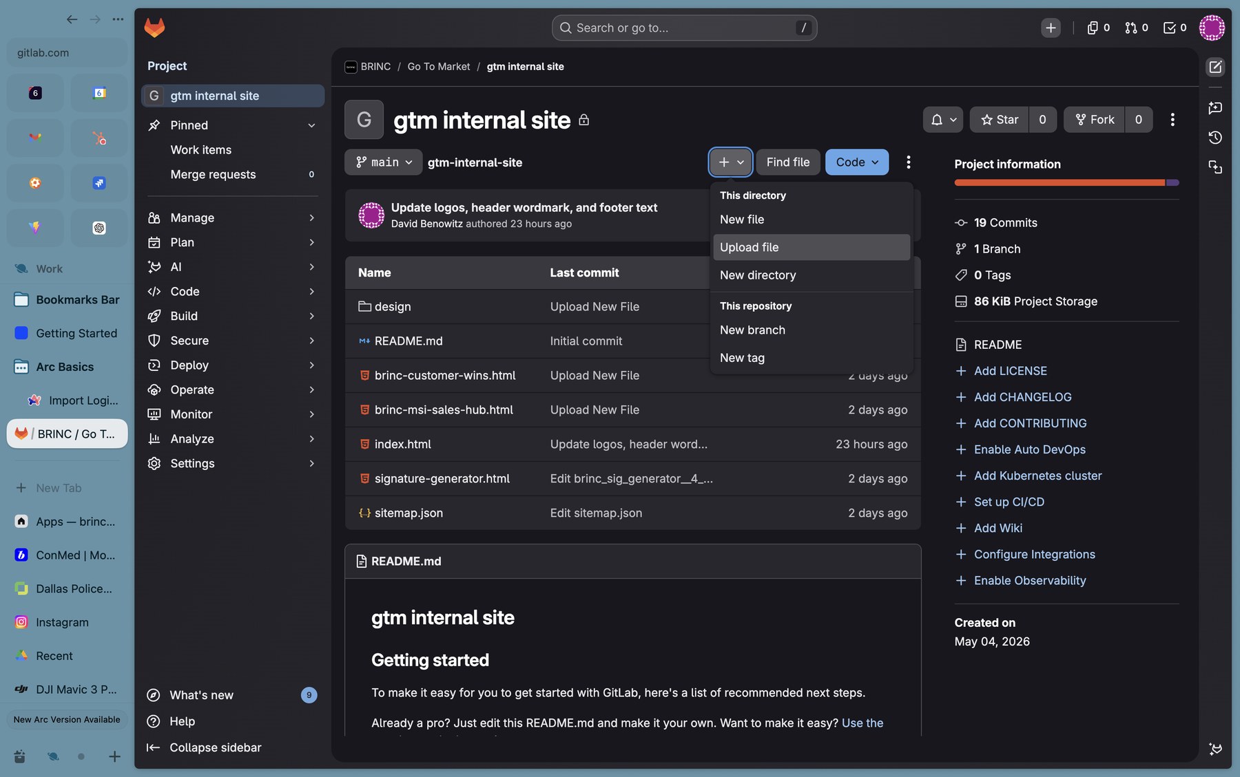 GitLab project page with the + dropdown menu open, showing 'Upload file', 'Upload directory', 'New file', and 'New directory' options.
